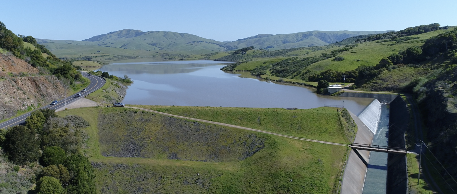 A reservoir and spillway.