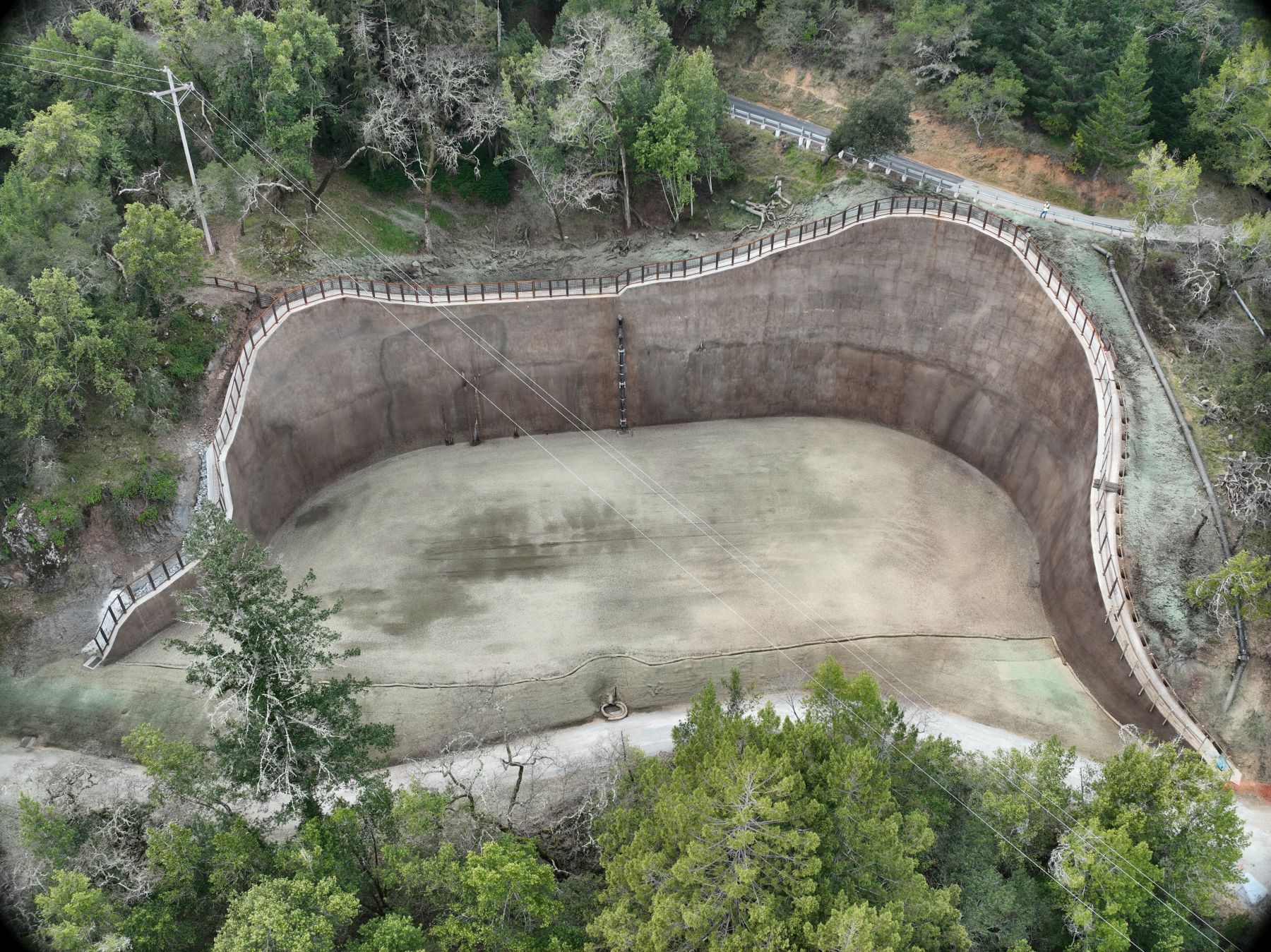 Aerial view of a retaining wall and pad.