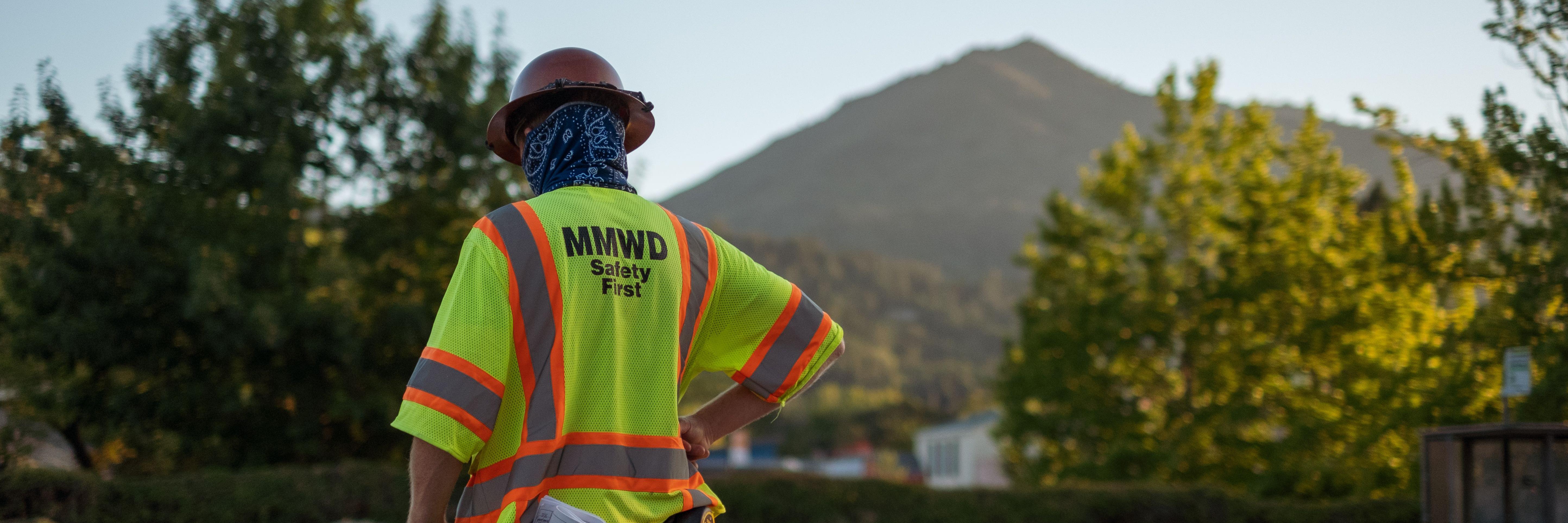 Marin Water employee with view of Mt. Tam in the background.