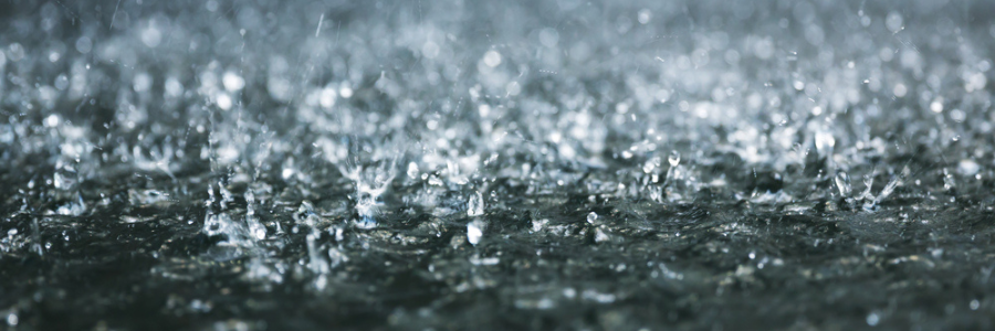 rain falls on a river.