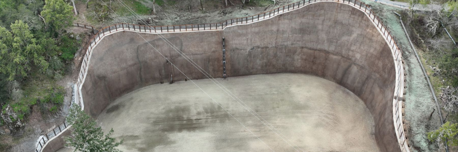 Aerial view of a large retaining wall.