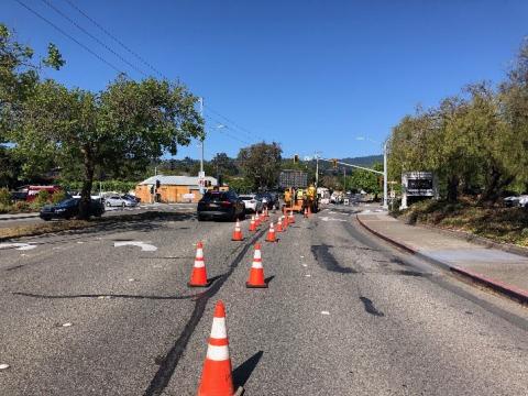 Traffic cones along the center of East Blithedale Avenue