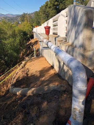 Pipeline along exterior of Southern Heights Bridge