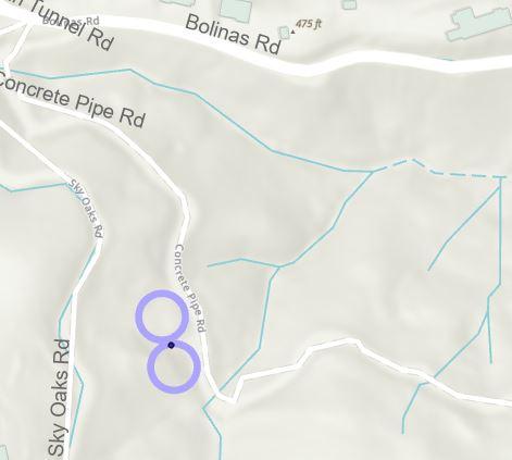 Map of two purple circles between Concrete Pipe Rd and Sky Oaks Rd
