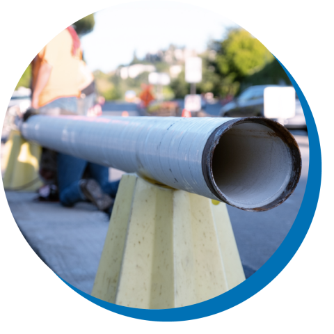 pipe with construction in background