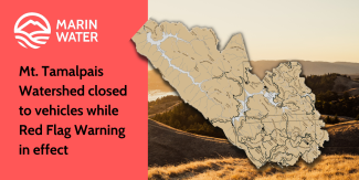 A map of the Mt. Tam Watershed overlayed on a photo of golden hills. The words "MARIN WATER Mt. Tam Watershed Closed to vehicles while Red Flag Warning in effect"