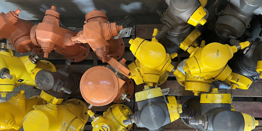 A series of fire hydrants stacked together and viewed from above. 